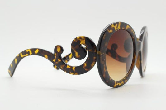 Y2K vintage oversized round sunglasses. Women’s tortoise frame with graduating smoky lenses and swirling arms. Unused NOS. 2000s